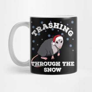 Christmas Opossum trashing through the snow Mug